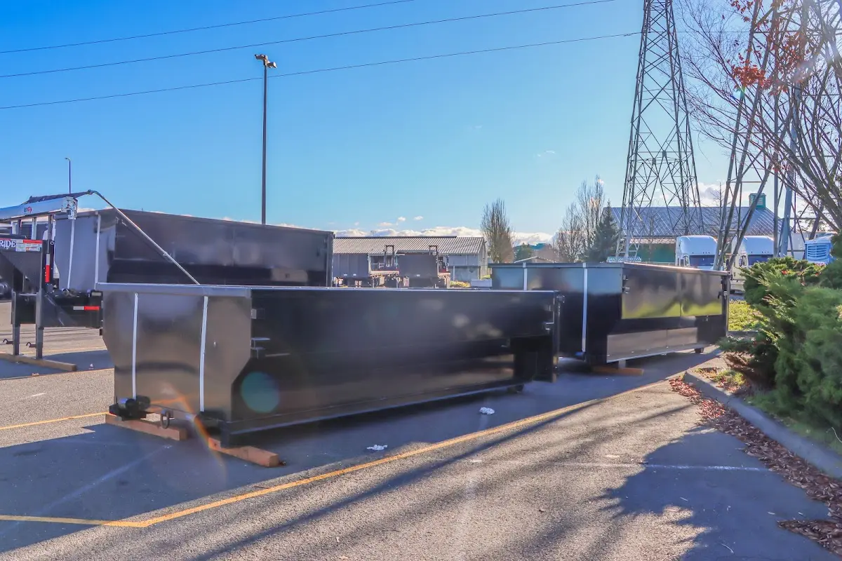 Roll-off dumpster ready for waste disposal at job site for 3 Yard Dumpster Rental in Castle Pines
